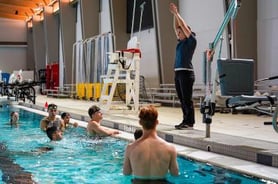 Motion Trek Pool Lift at indoor competitive pool