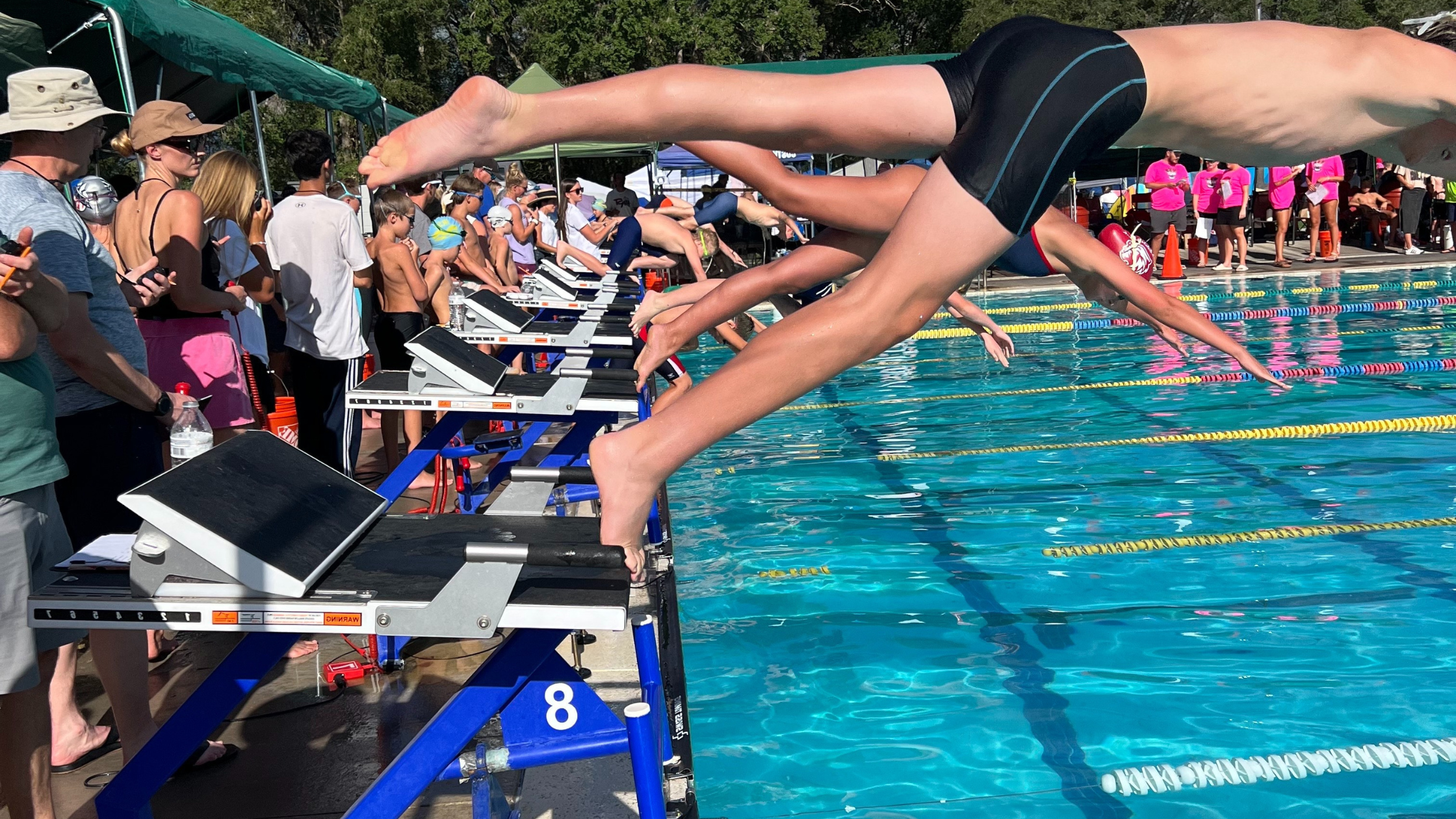 Swimmer starting off the Sprint with Rapid Lock starting block top