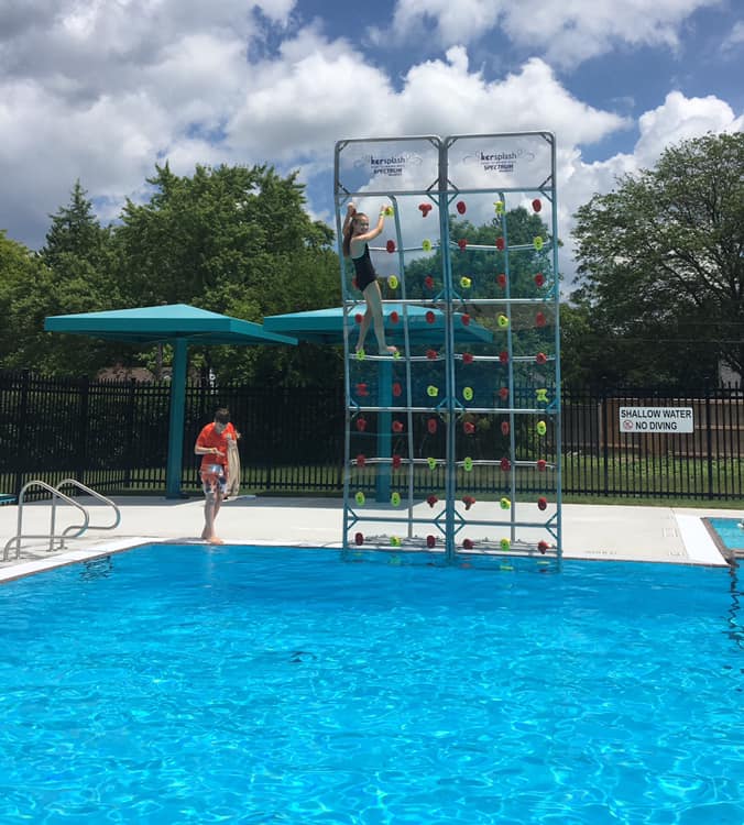 Kersplash Pool Climbing Wall with little girl