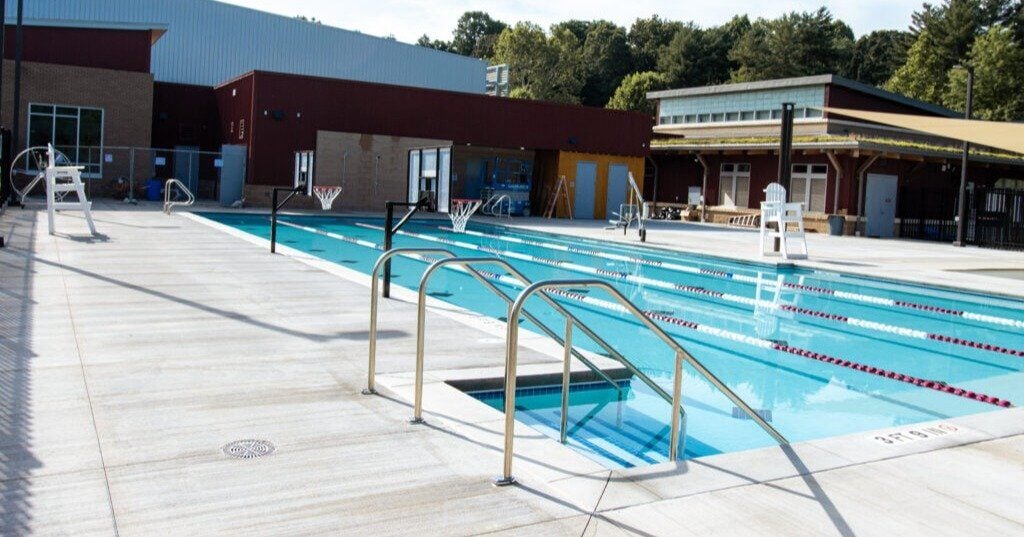 Recreational outdoor pool with Jamma Jr! Poolside Basketball Hoops