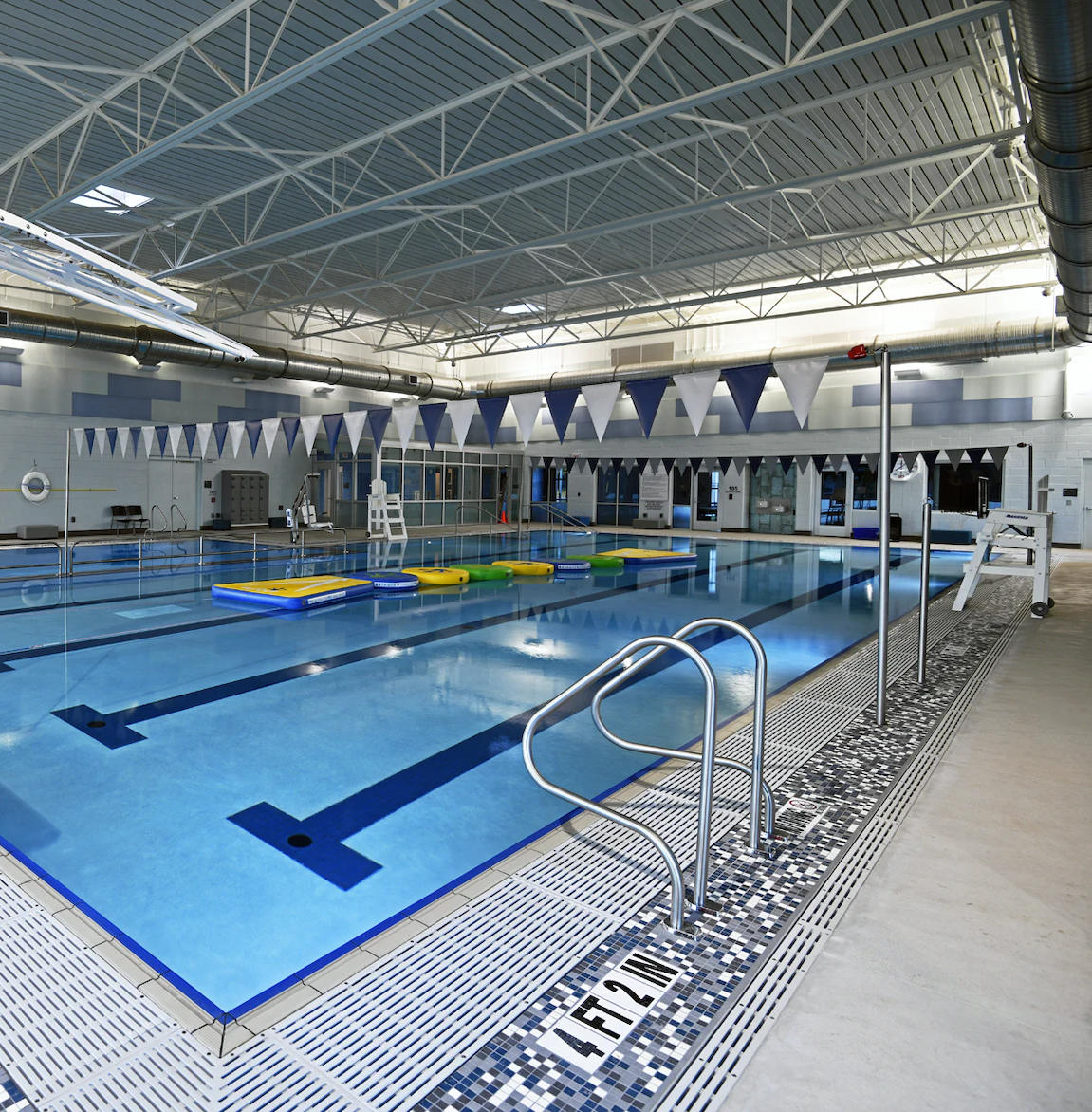 Indoor pool with Mendota Lifeguard chairs