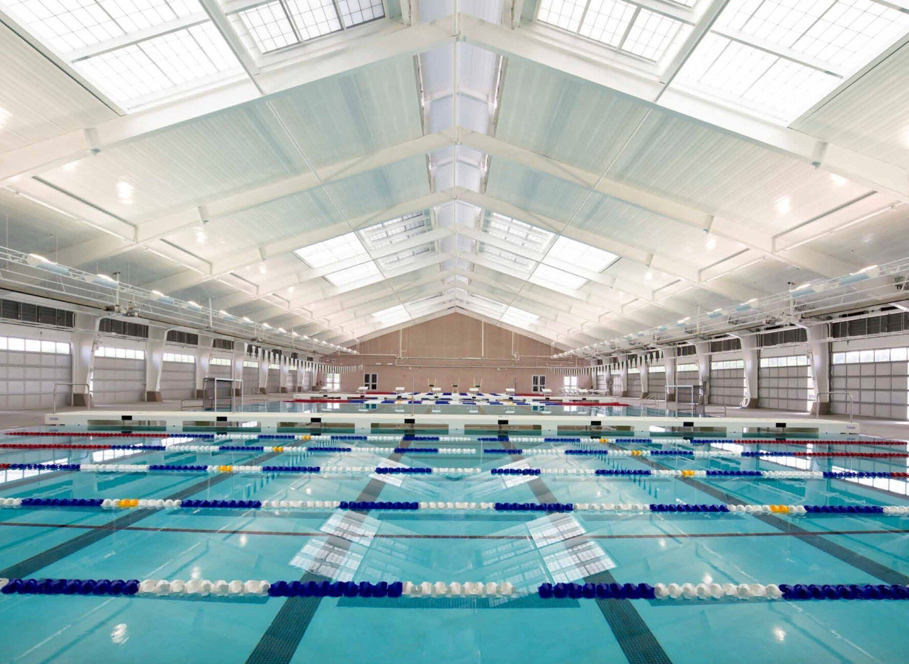 Indoor Aquatics Facility with stainless steel rails and ladders