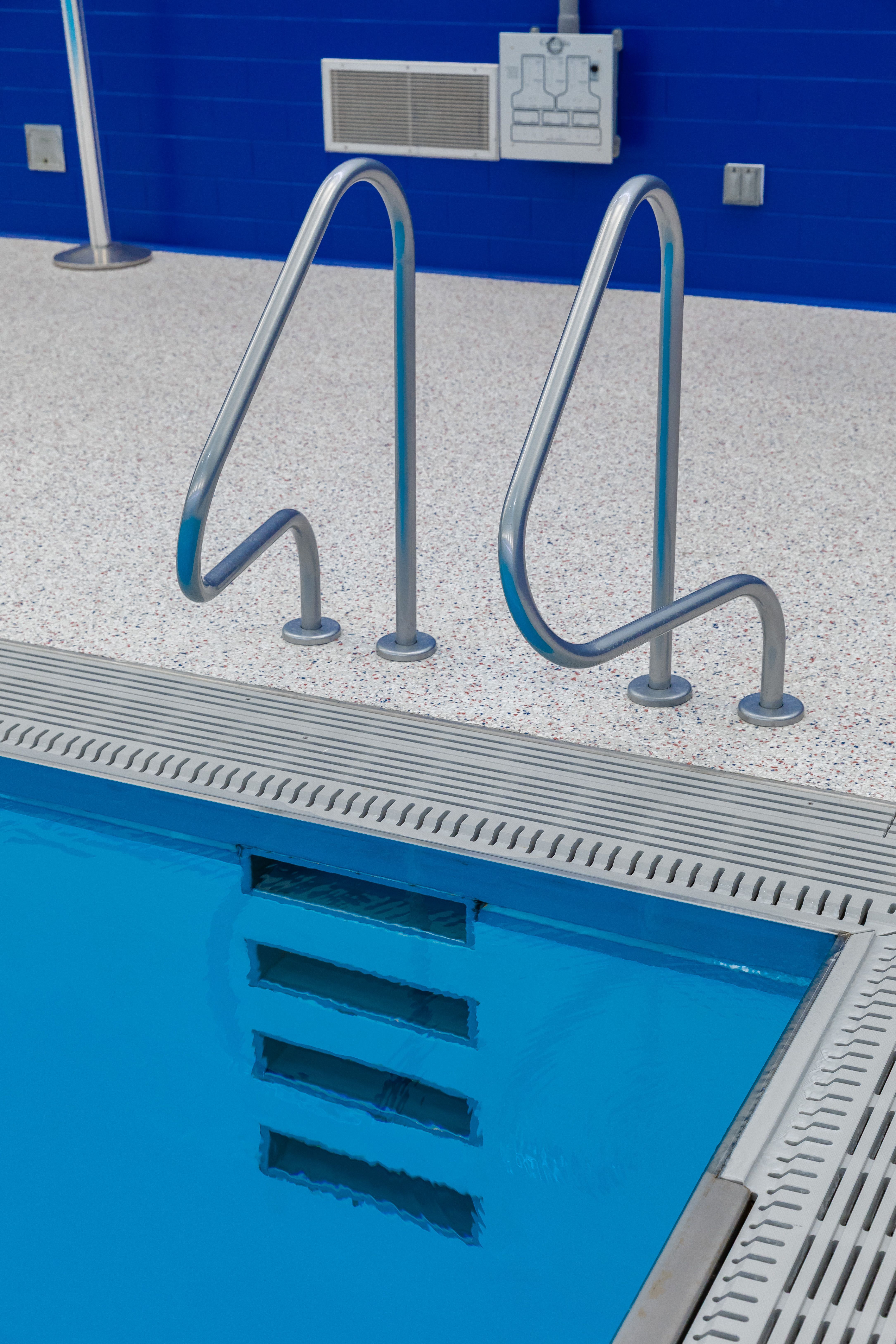 Recessed Stainless Steel Steps at indoor pool