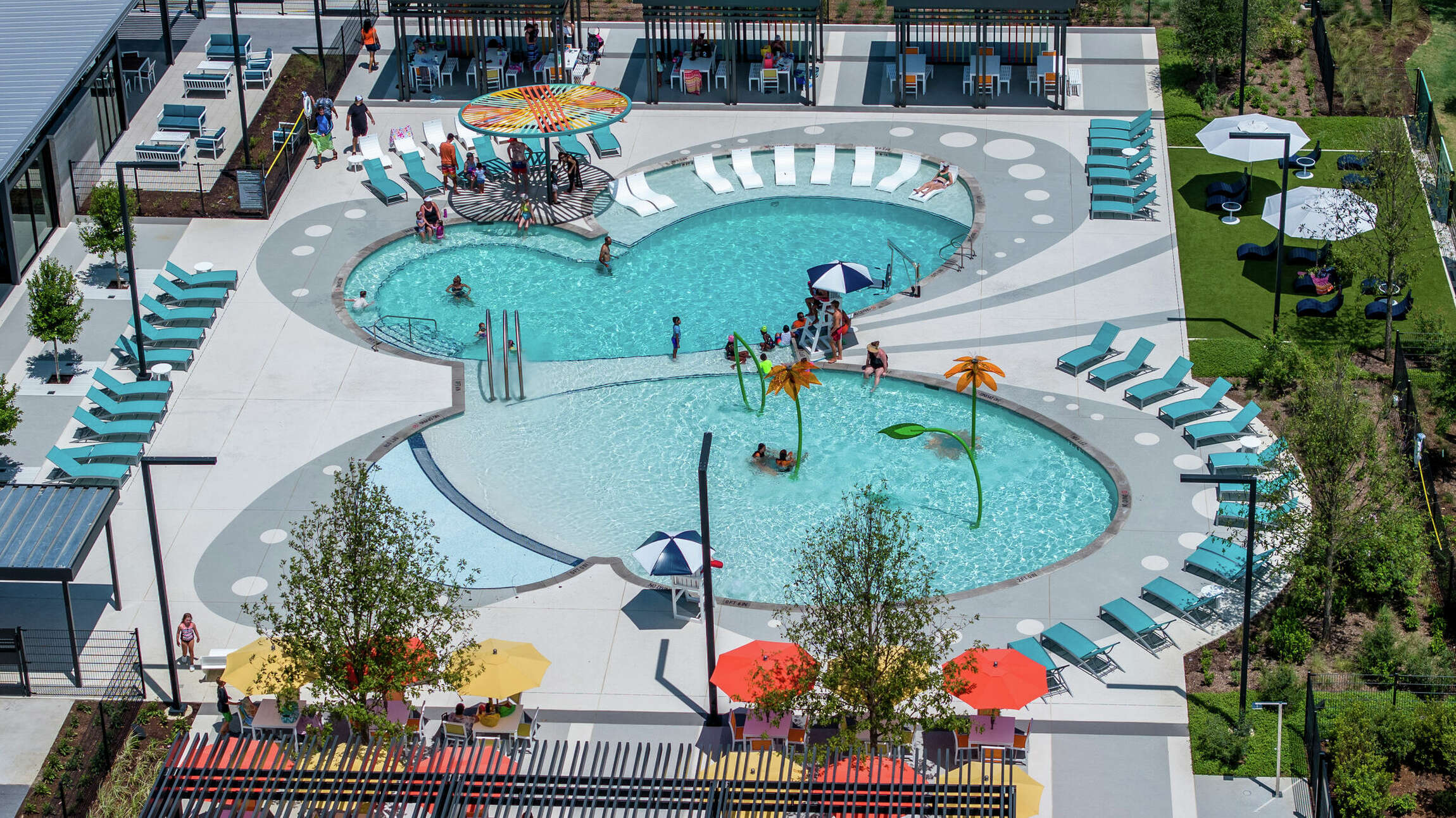 Butterfly shaped outdoor pool with Spectrum Aquatics stainless steel equipment