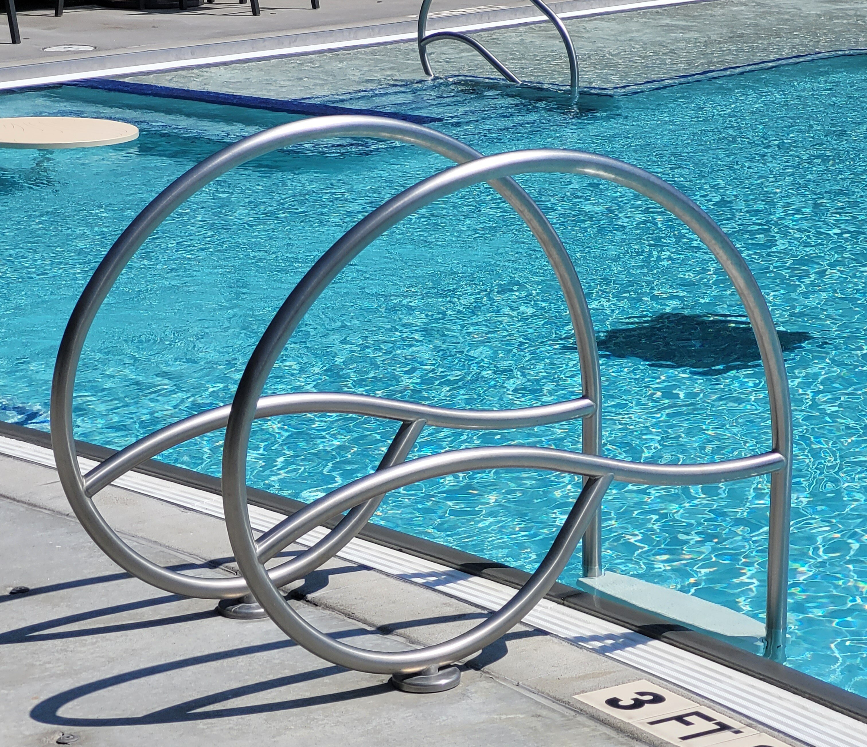 Solarian Stainless Steel Rails at an outdoor pool