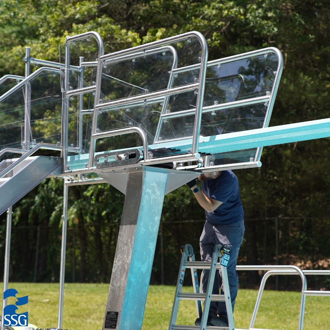 custom stainless steel dive stand at outdoor pool