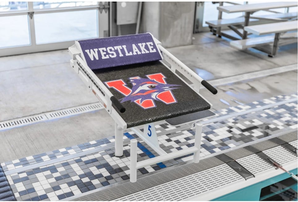 Custom Xcelelrator swim starting blocks at indoor pool