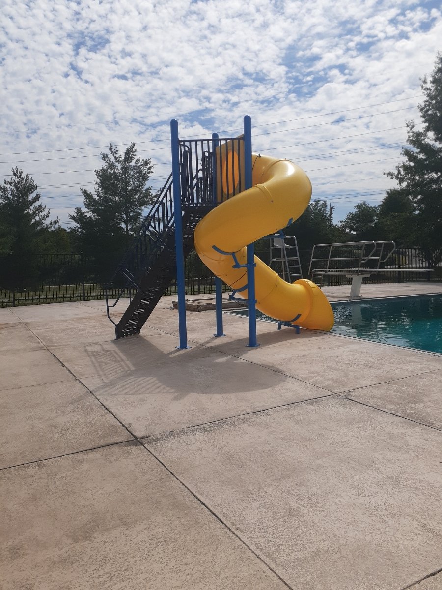 Single Flume Poolside Slide at outdoor pool