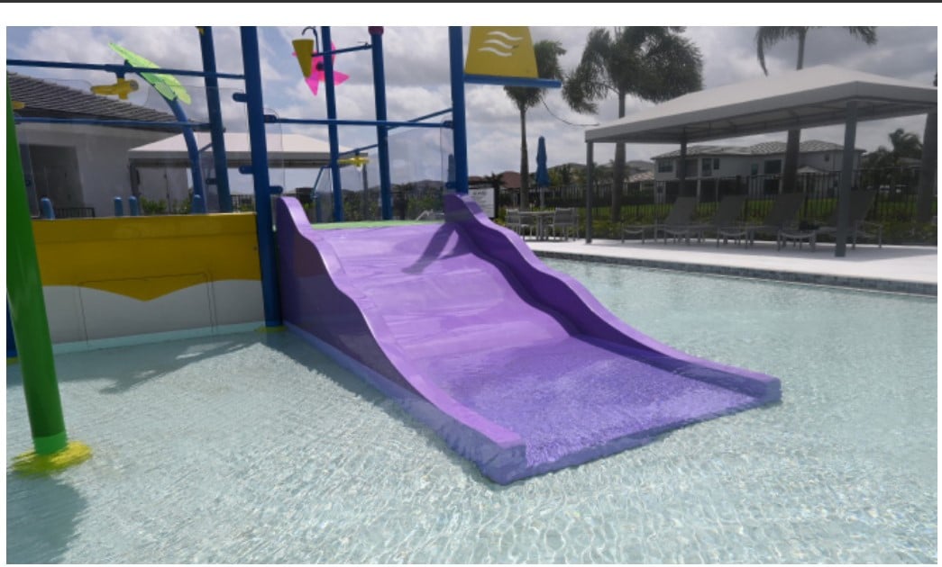 SlideWorx Series Open Single Flume Children's Poolside Slide at outdoor pool
