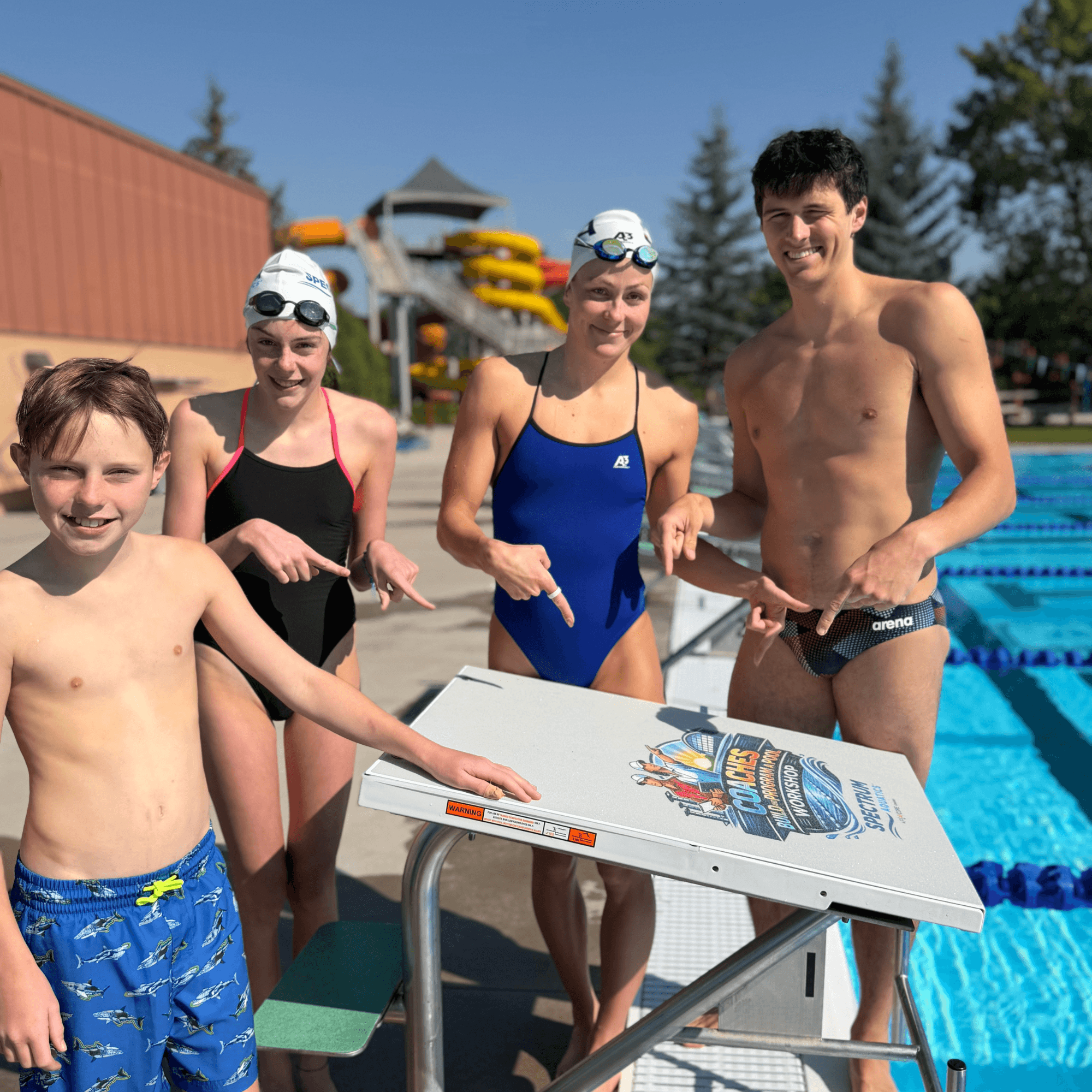 Katharine Berkoff and other swimmers with the Dash Swimming Starting Block