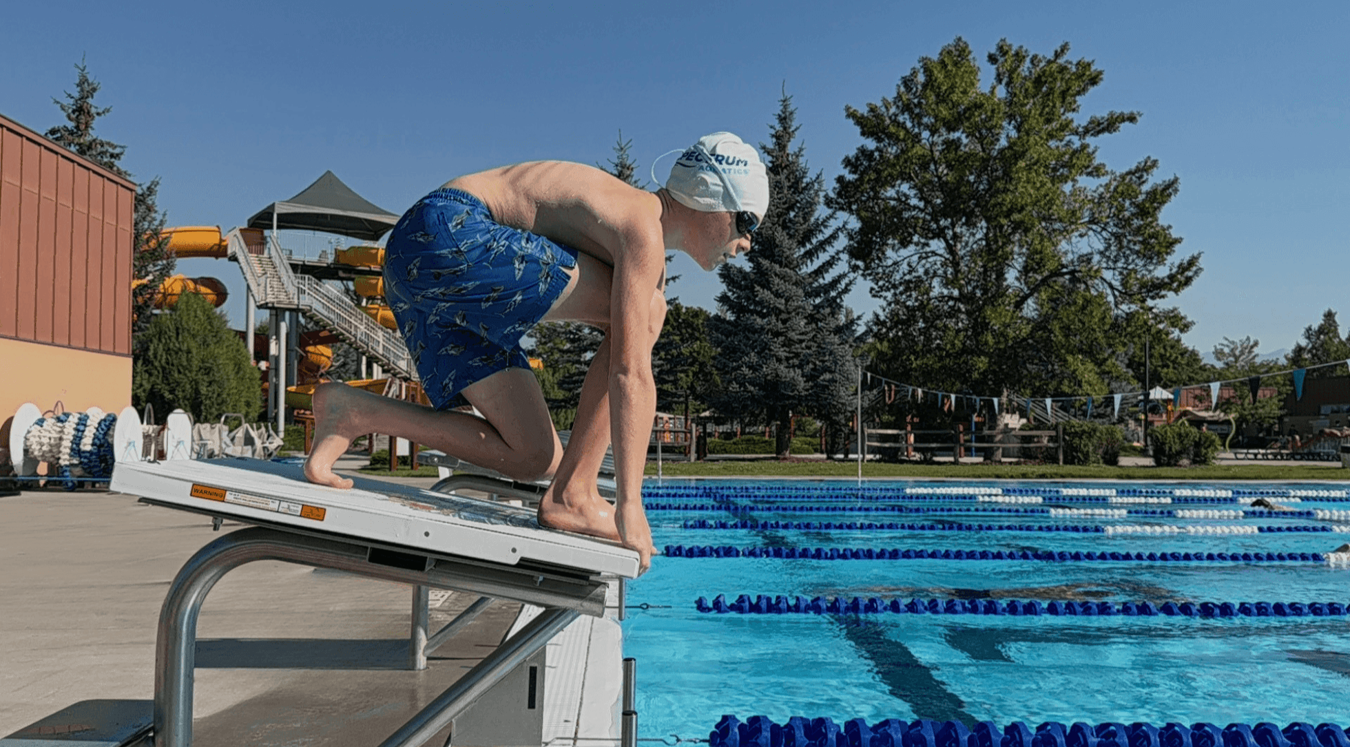 Young male athlete on the Dash Swimming Starting Block